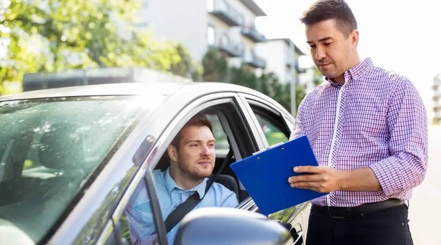 Licensed Queensland examiner with safety certificate showing roadworthy and safety certificate same document