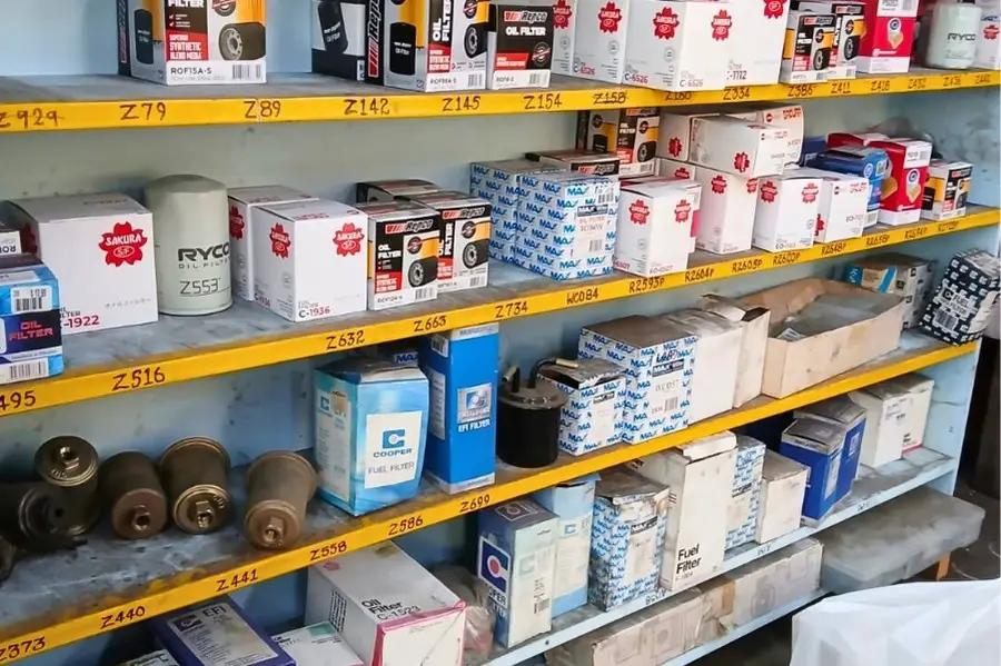 Shelves stocked with assorted automotive filters.