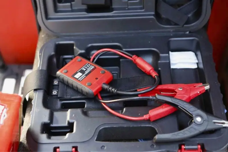 Portable jump starter in carrying case